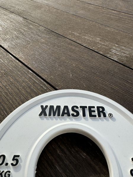 Малі фракційні диски для важкої атлетики преміум Xmaster Mini Rubber Change Plates XmasterMiniRubberChangePlates0point5kg фото